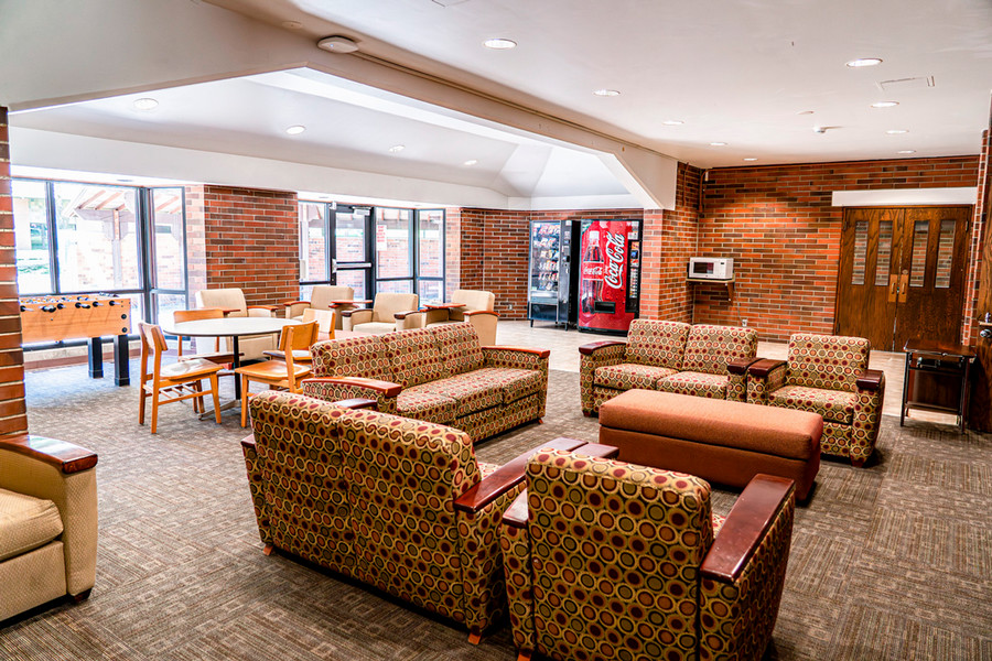 Common area with couches, TV and game table