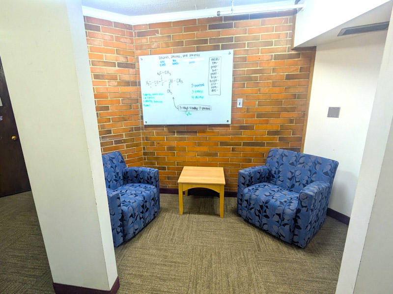 Study area with two chairs and a whiteboard