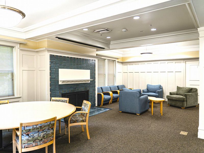 Lounge with couches, chairs, and a table
