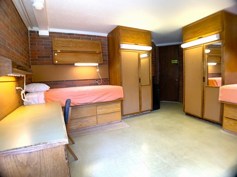 Entrance to room between two closets