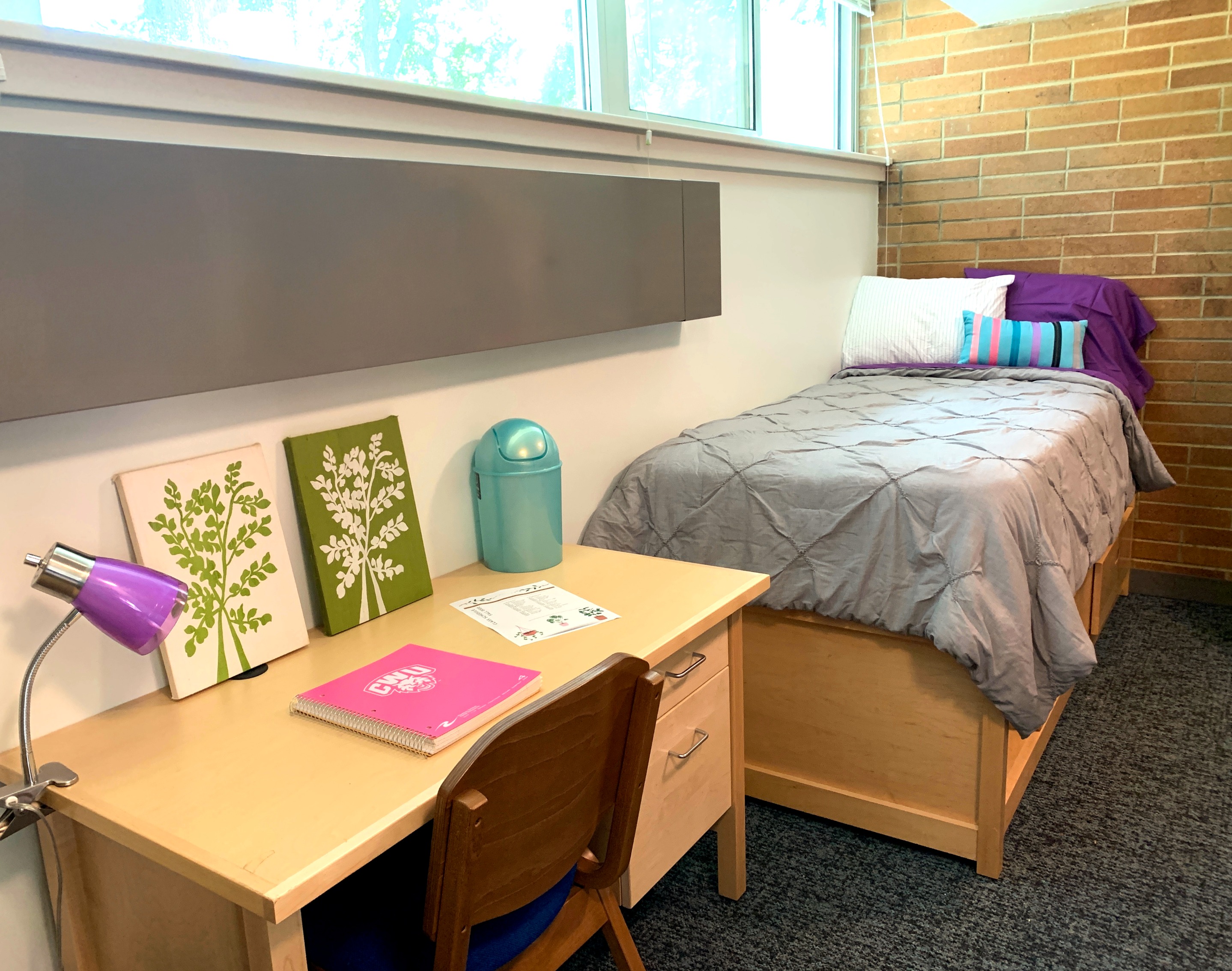 Room with twin XL bed, desk, and closet