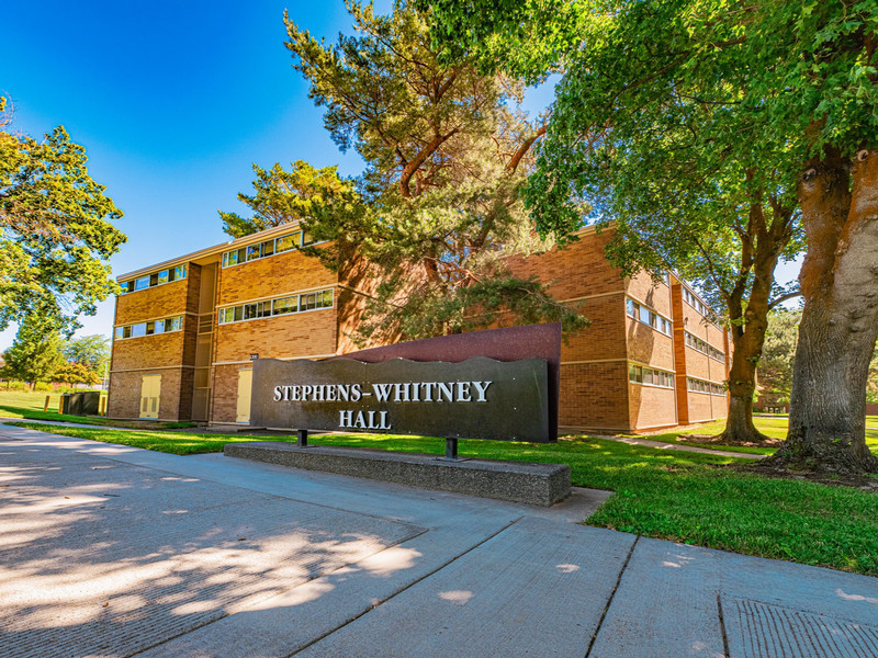 Three-story residence hall with outside entrances to rooms
