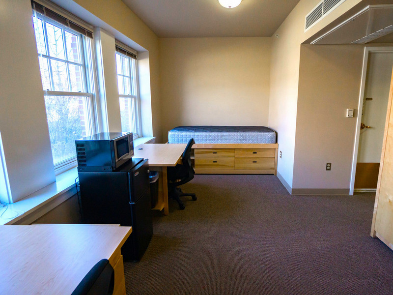 Double room showing bed and two desks