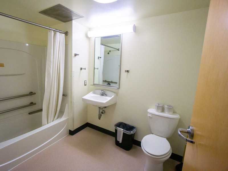 Bathroom with tub, sink, and toilet