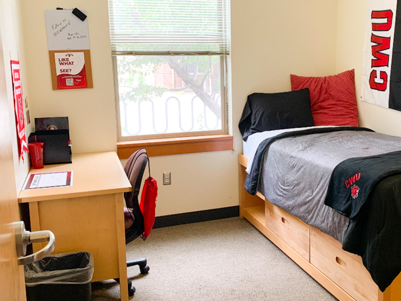 Single room with twin XL bed, desk, and desk chair