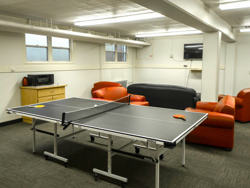 Lounge with ping pong table and couches