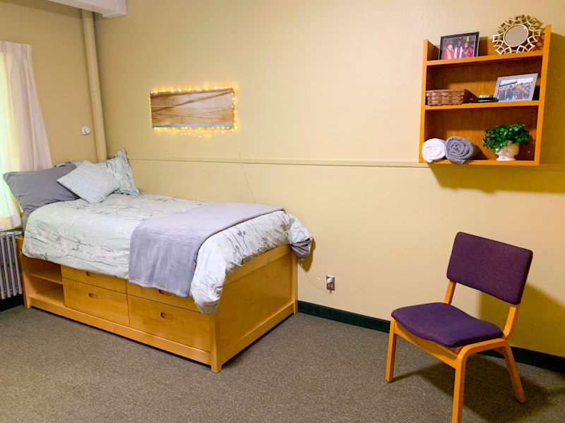 Single room with twin XL bed, desk, and desk chair