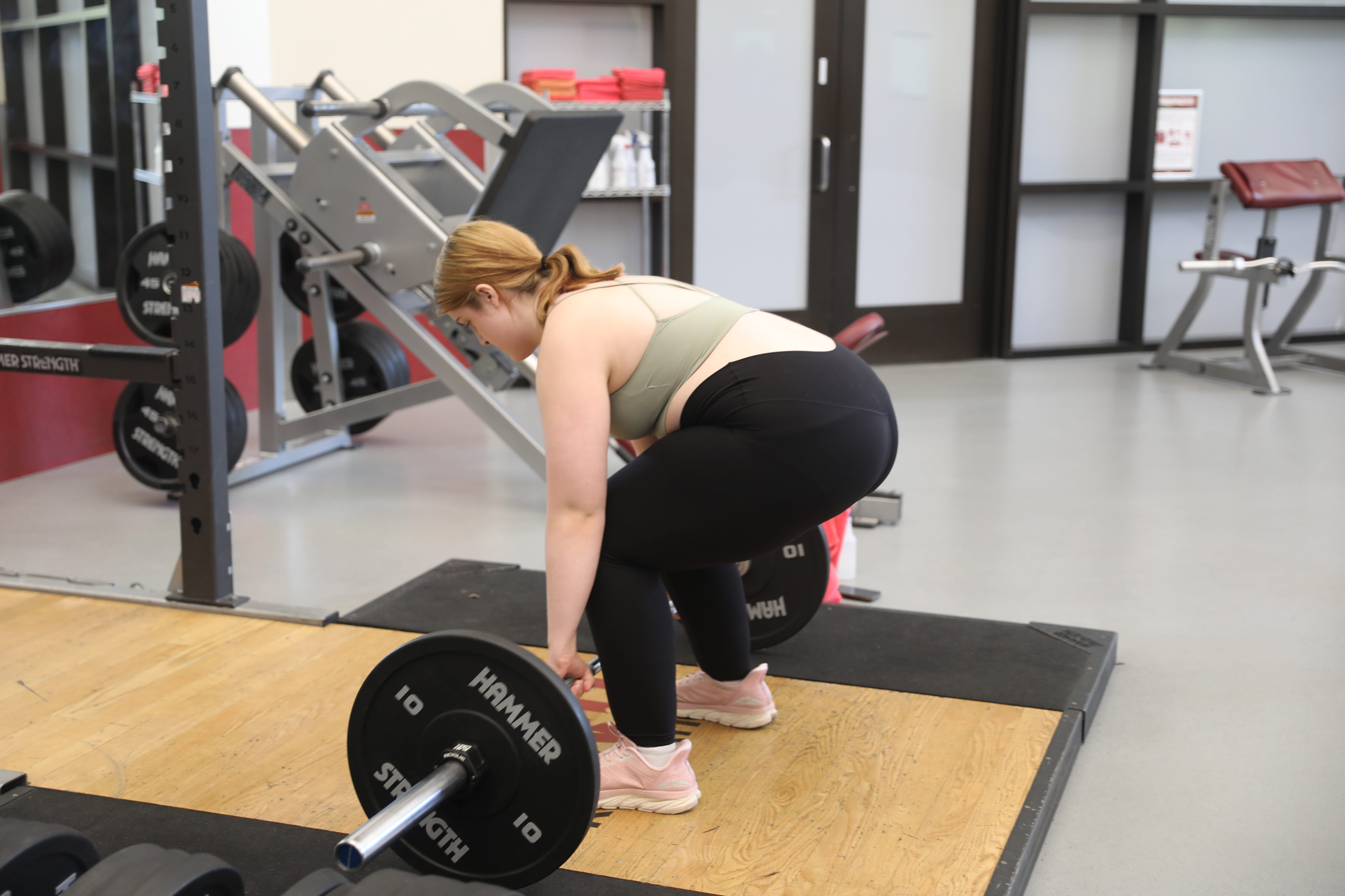 squatting on hack squat