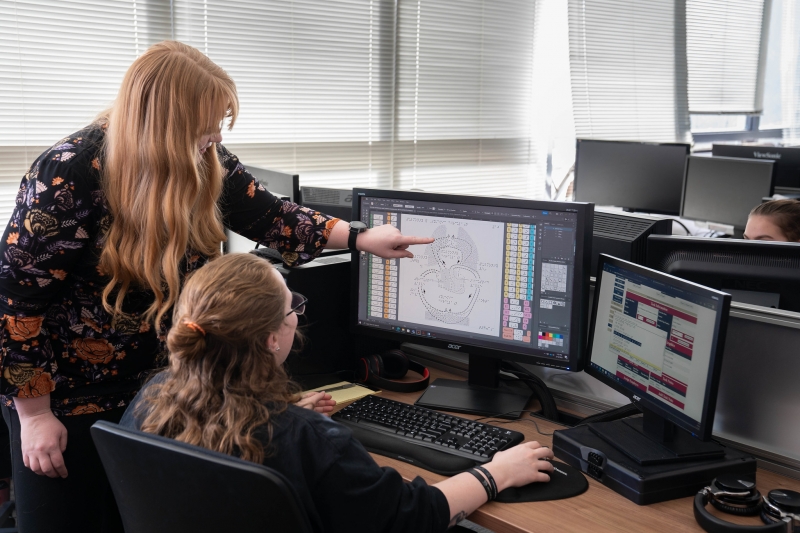 Central Access Administrator Vernée Hemphill helps a student with the creation of a tactile graphic